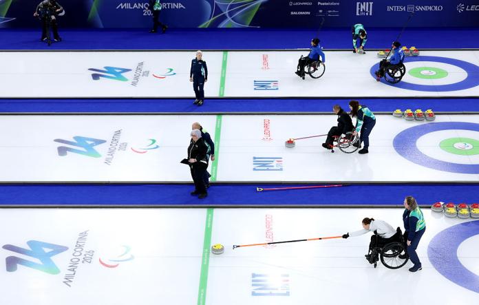Athletes compete in wheelchair curling on three sheets of ice at the Milano Cortina 2026 Paralympic Winter Games