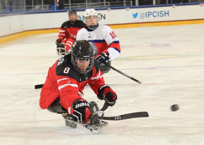 Tyler McGregor races after the puck in Canada's preliminary round game against Norway at Buffalo 2015.