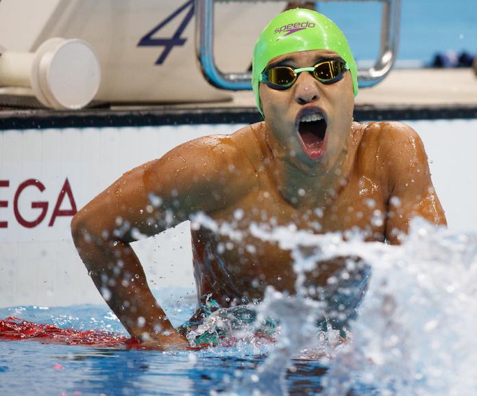 Carlos Serrano Zarate COL takes the Gold Medal in a new World Record time in the Men's 100m Breaststroke.
