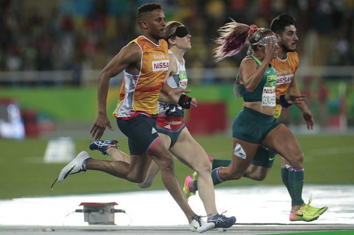 Terezinha Guilhermina of Brazil and Libby Clebb of Great Britain compete in the Women's 100m T11 Final at the Rio 2016 Paralympic Games.