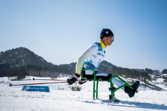 a male Nordic sit skier