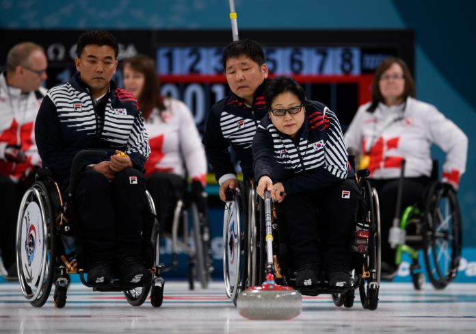 female wheelchair curler Min-Ja Bang