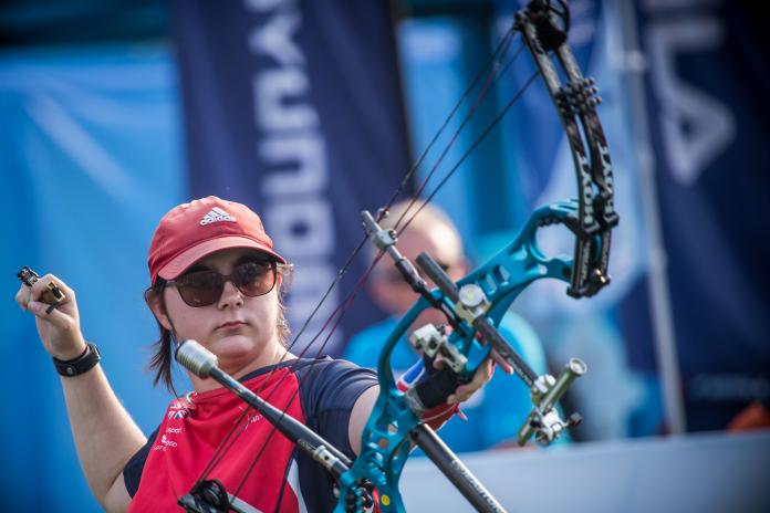 Jessica Stretton wearing glasses and a cap while competing