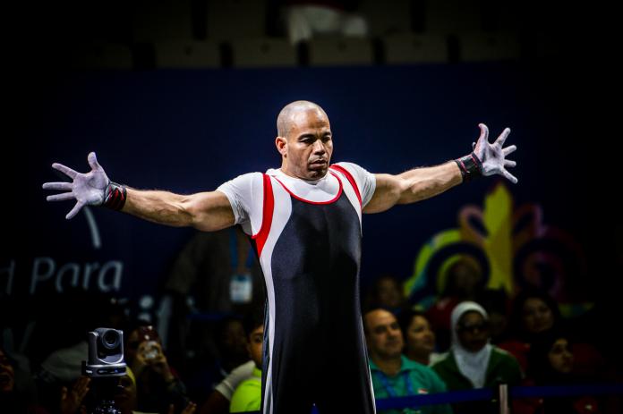 Egyptian powerlifter Sherif Osman opens his arms