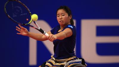 a female wheelchair tennis player