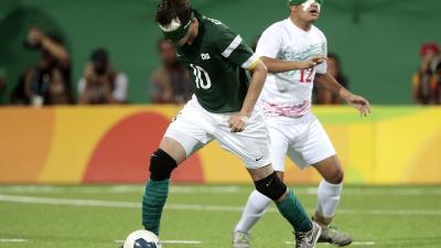 a male blind footballer