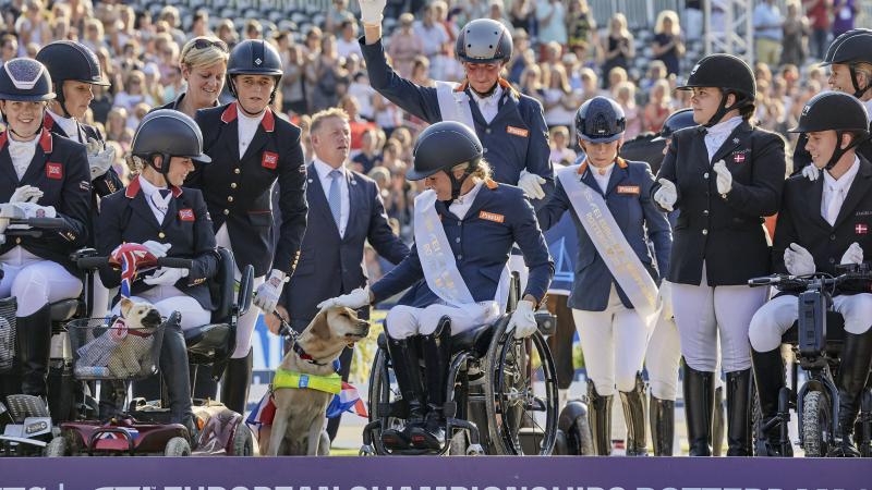 Group photo of Dutch Para dressage team on podium