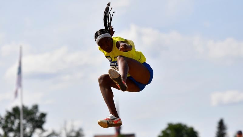 Ecuadorian athlete Kiara Rodriguez flies in the air after her jump