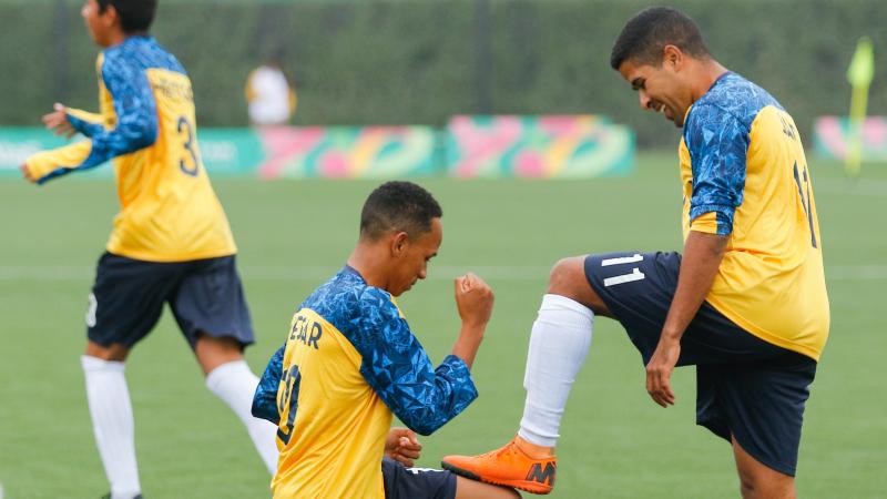 male football 7 players celebrate a goal 