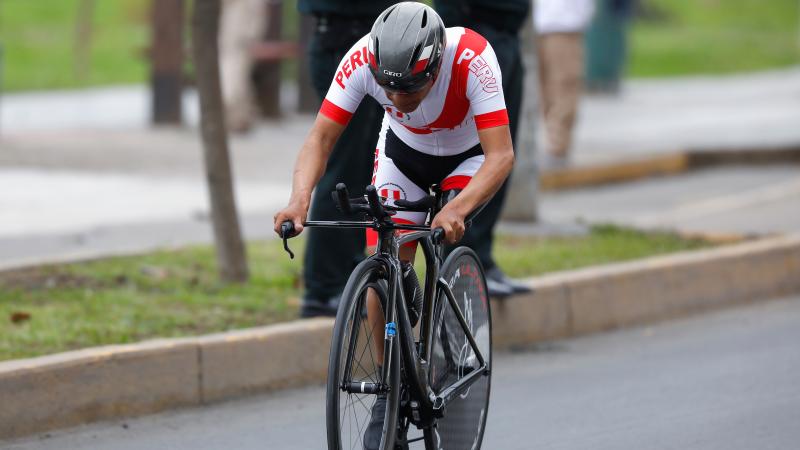 a male Para cyclist on the road