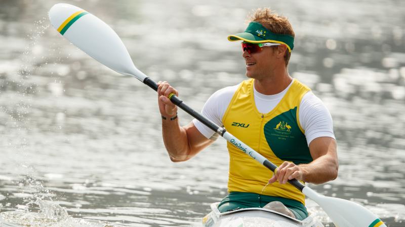 a male Para canoeist on the water
