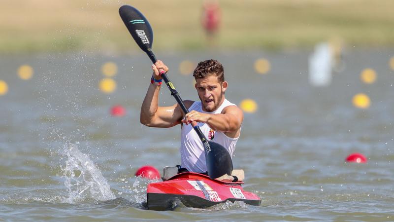 Man paddles in kayak