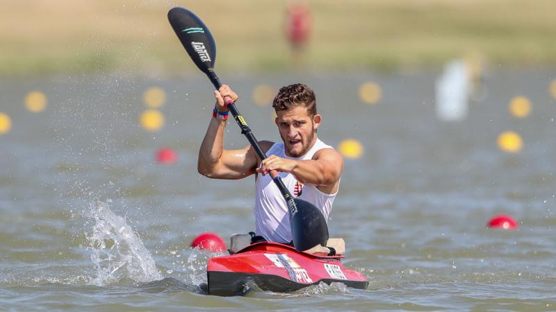 Man paddles in kayak