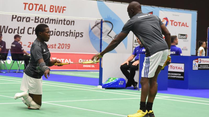 Two Uganda mixed doubles partners on the badminton court