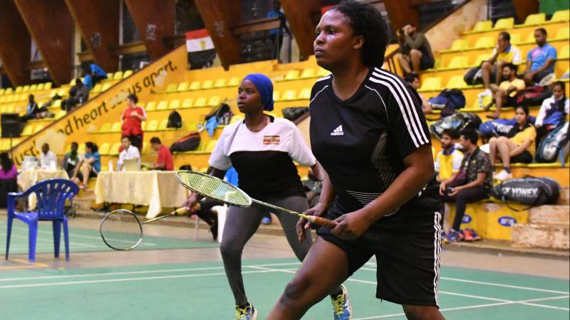 Double female badminton team on the court