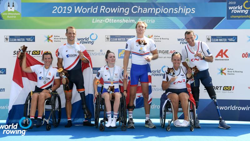 Podium photo of six rowers 