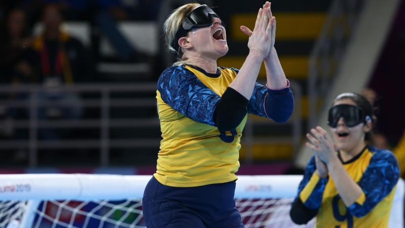 female goalball players celebrating