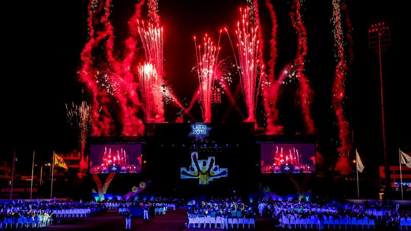 fireworks exploding over a stage