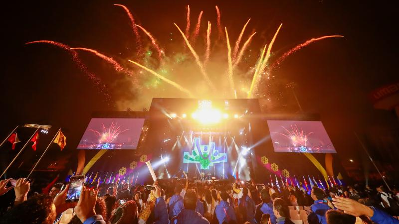 fireworks exploding over a stage