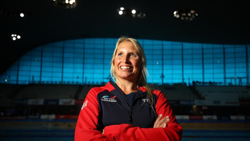 Photo portrait of British swimmer inside venue