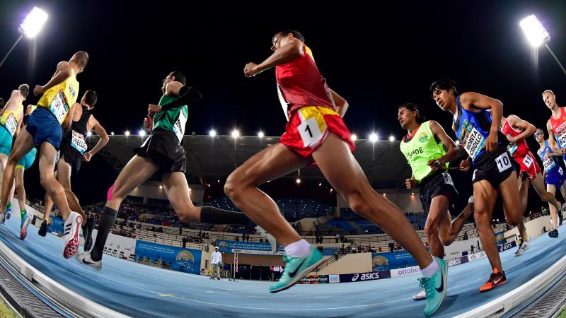 Athletes run through the track at the Dubai 2019 World Championships