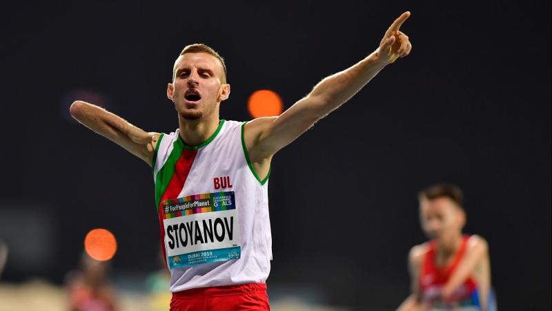 Hristiyan Stoyanov celebrates after crossing finish lie