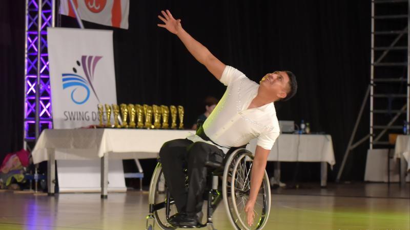 Mexican man in wheelchair dancing