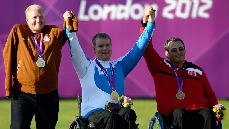 Three male archers who won medals at London 2012