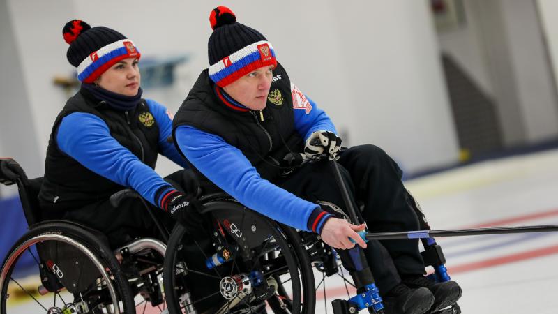 Konstantin Kurokhtin and Daria Shchukina during a wheelchair curling game