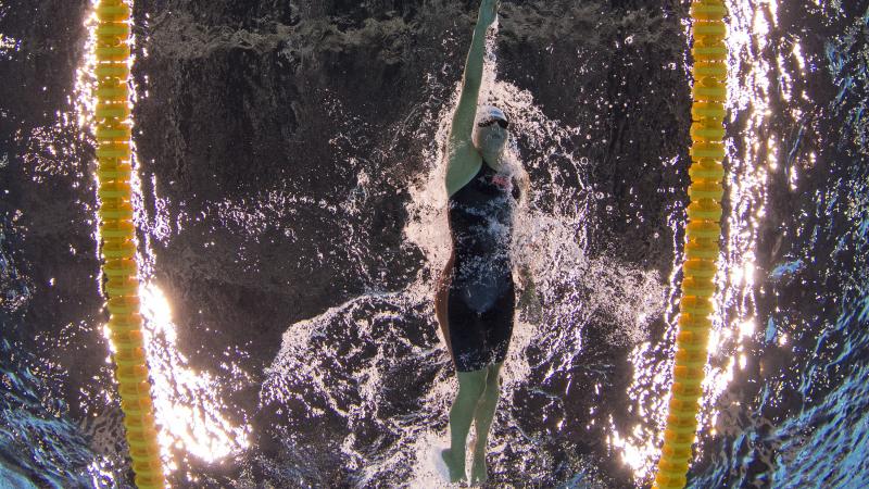 The underwater image of a female swimmer