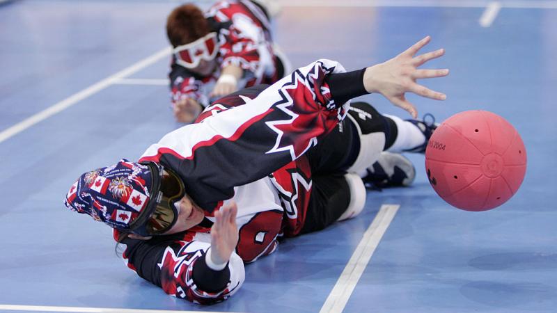 Canadian female goalball player makes a diving block