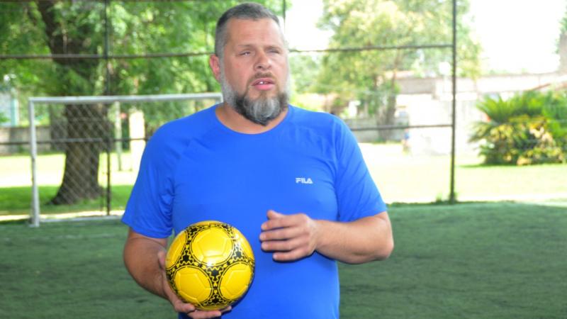 Diego Cerega holds a ball