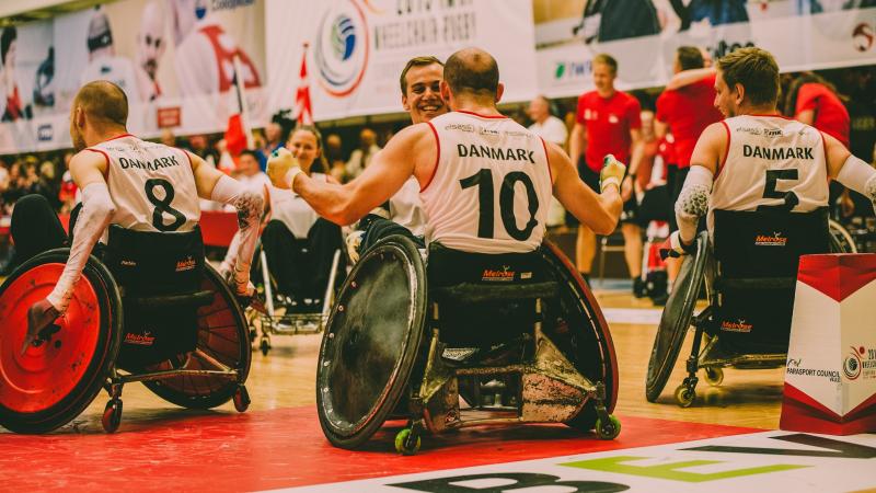 Danish men celebrate victory at wheelchair rugby tournament