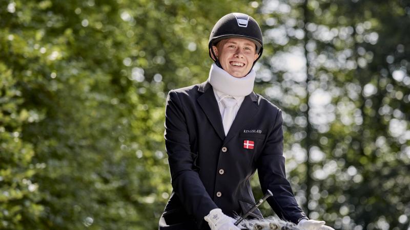 Man smiling on his horse