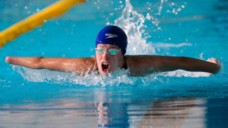 Amy Marren swimming in a butterfly event