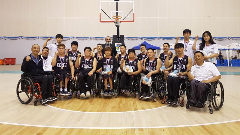 Group photo of Korean wheelchair basketball team