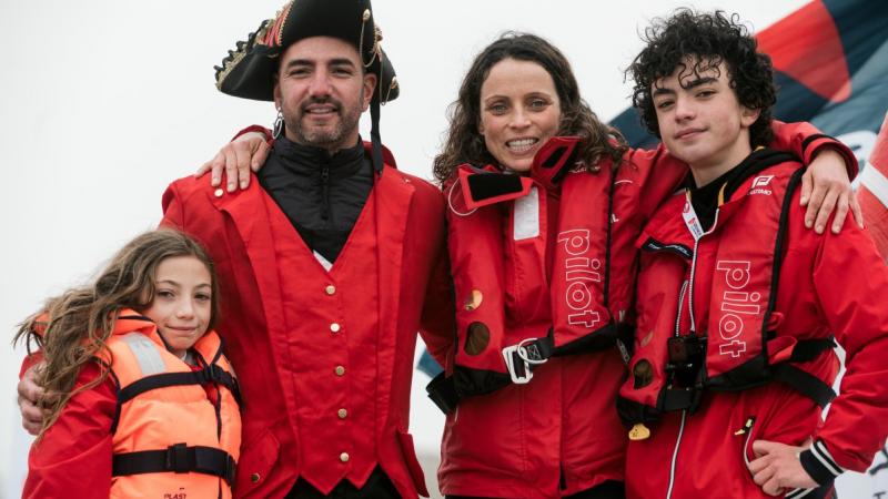 Male sailor with his wife and two kids