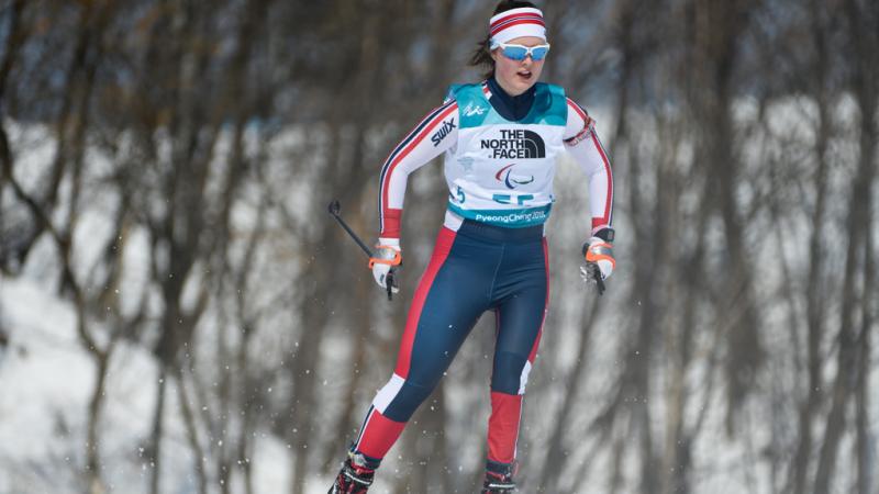 A female athlete competing in a Para cross-country event