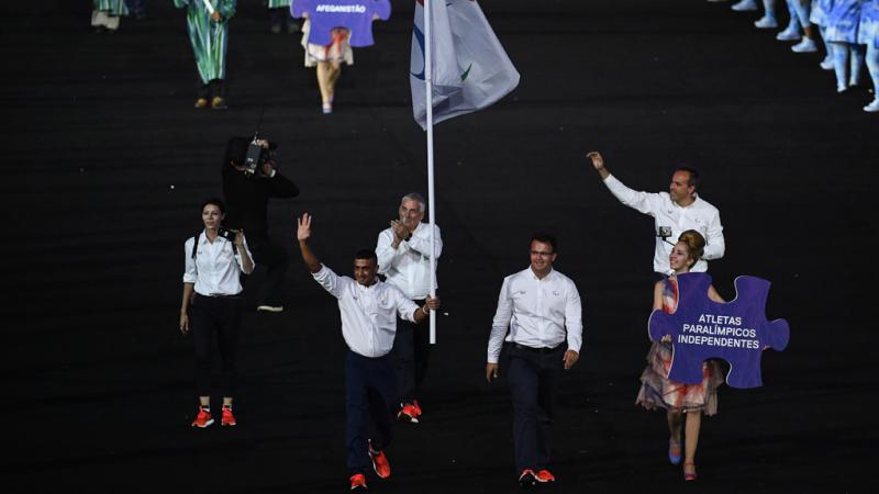 Small group entering the arena during the Opening Ceremony