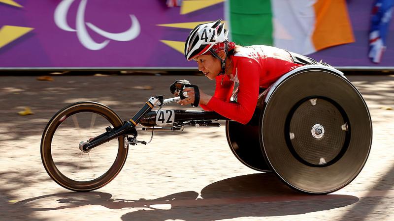 Japanese woman competing in her racing chair