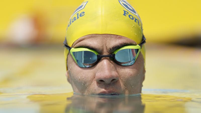 Mohammad Abbas Karimi emerges from the water