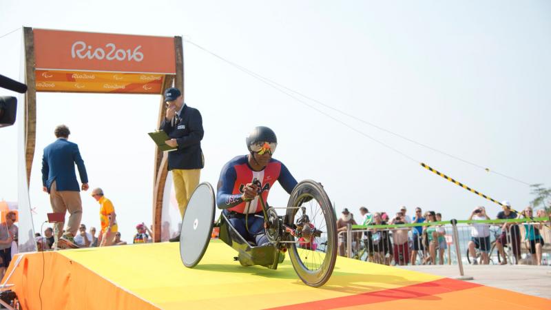 Man in handcycle begins his time trial race at the Rio 2016 Paralympics