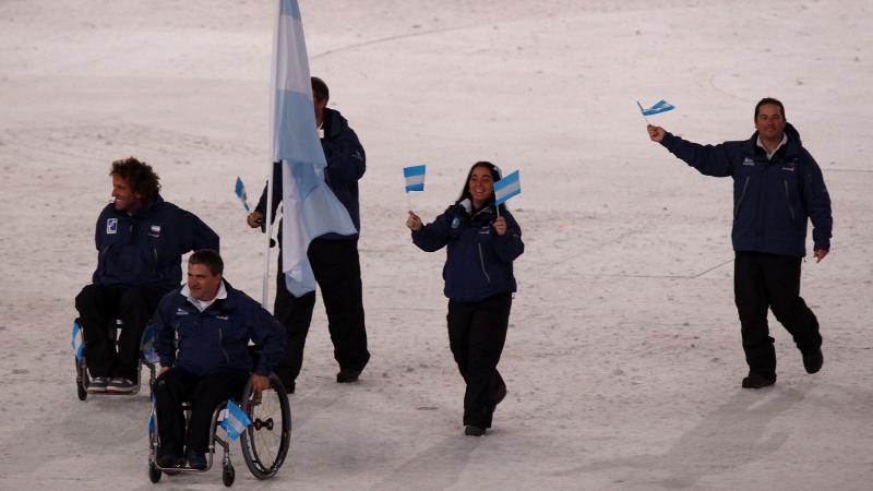 Jean Maggi carrying Argentina's flag at the Opening Ceremony of Vancouver 2010
