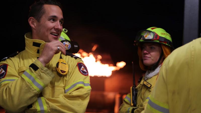 Man and woman in firefighters gear