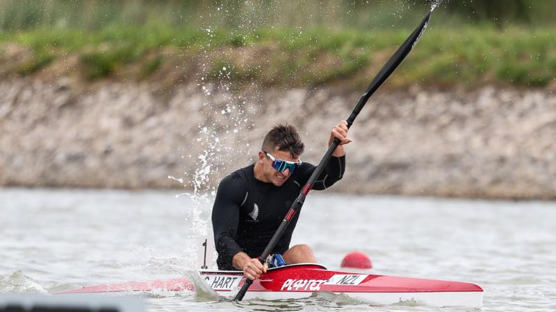 New Zealand man paddles in kayak