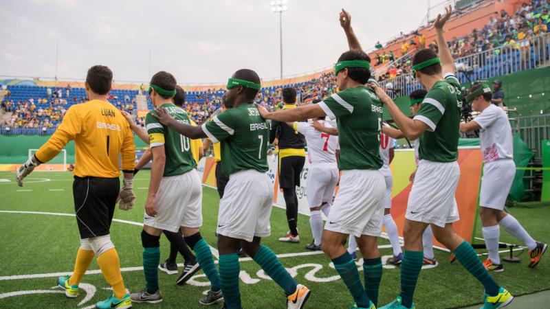 Brazilian football 5-a-side team entering the stadium