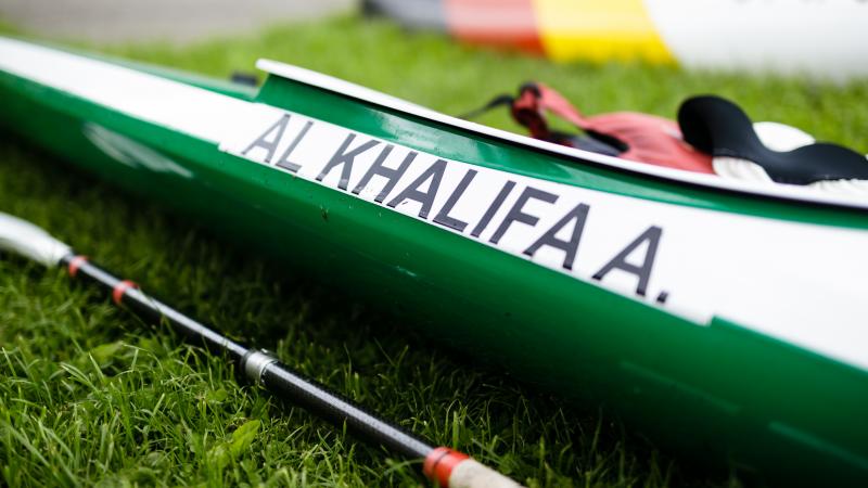 Close shot of kayak with Al Khalifa A. written on its side