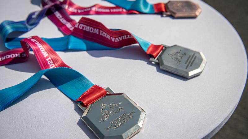 A table with three medals 