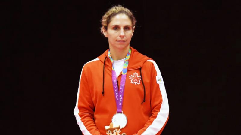 Canadian athlete with her Lima 2019 silver medal hanging around her neck