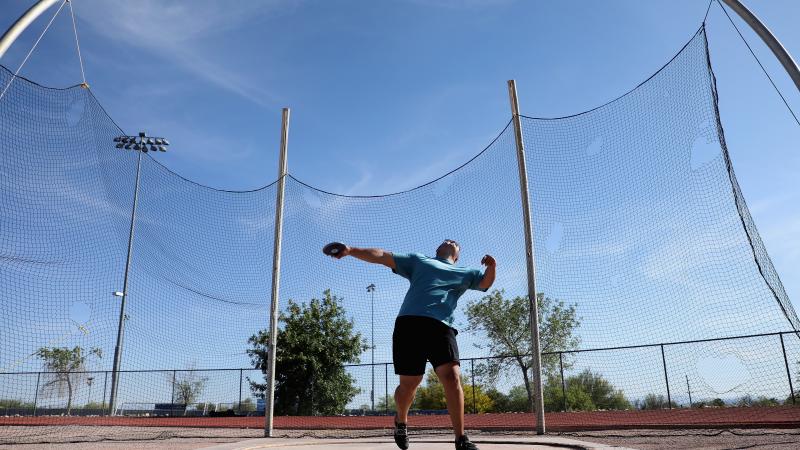 Refugee Para athlete Shahrad Nasajpour throwing the discus